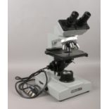 A Kyowa Unilux-11 microscope, with A4, A10, A40 and A100 objectives. No: 842352. Microscope switches