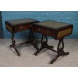 A pair of mahogany sofa tables with lyre supports.