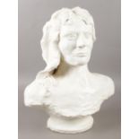 A plaster cast bust of a woman. Height 40cm.