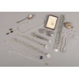 A quantity of silver and silver jewellery. Including necklaces, bracelets, pill boxes, spoon, etc.