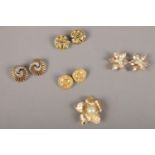 A vintage Christian Dior brooch & four pairs of ear clips.