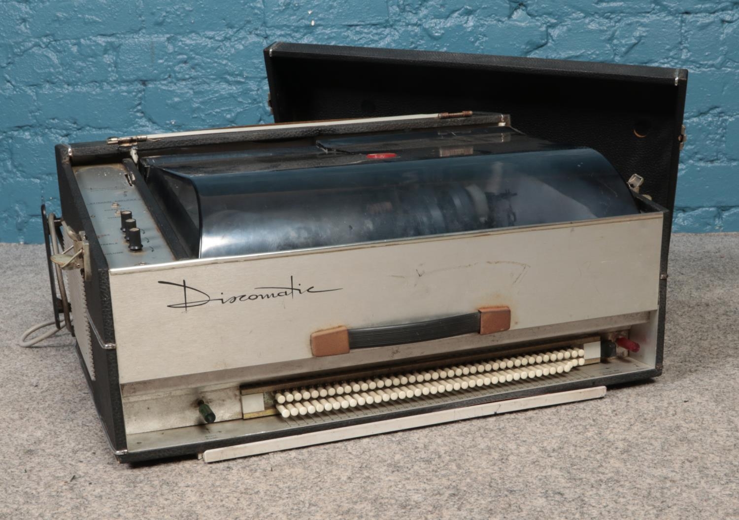 A Discomatic c1960's portable jukebox. Comes with facility to hold forty single vinyl records. - Image 2 of 2