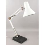 A Micromark articulating anglepoise lamp, with enamel body and shade. In working order. Chip on