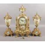A gilt metal Lancini three piece clock garniture, with porcelain panels depicting figures and scenes