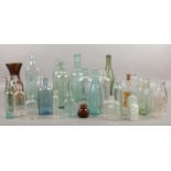 A collection of vintage glass bottles. Woodward Chemist Nottingham, Poison, Walter Tomlinson