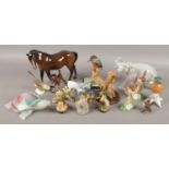 A collection of ceramic animals, to include examples from Beswick, Goebel and Border Fine Arts.