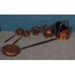 A selection of copperwares. To include kettle, coal scuttle, bed warmer and coffee pot etc.