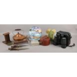 An assortment of collectable items. To include carving set, Tasco binoculars, two pairs of