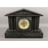 A Victorian slate mantel clock with roman numeral markers. (42.5cm wide)