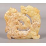 A Chinese hardstone carving formed as a dragon and rat. 6cm.