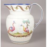 An early 19th century pearlware jug painted in coloured enamels with exotic birds in landscape.