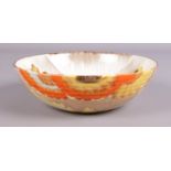 A Clarice Cliff ribbed bowl in the 'Rhodanthe' design. Marked Wilkinson LTD to base. (20cm diameter)