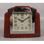 A Jaz Art Deco bakelite alarm clock. H:14cm W: 16cm.