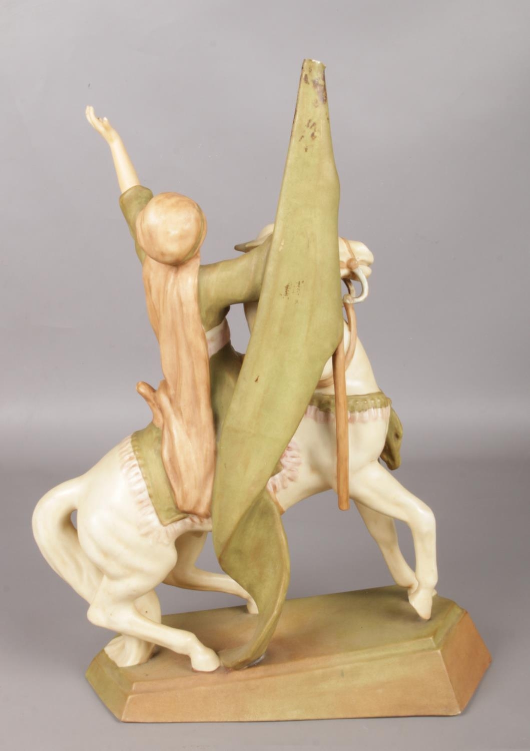 A Royal Dux figure modelled as a man carrying a flag on horseback. 45cm. The Dux is in very good - Image 2 of 3