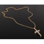 A 9ct gold cross pendant and chain. 4.96g gross weight. 52cm.