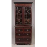 A Regency mahogany and walnut dwarf bookcase with astrigal glazed top and drawer base. Height 158cm,