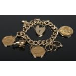 A 9ct Gold charm bracelet, containing a Victorian 1885 full sovereign, in 9ct Gold mount,