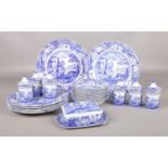 A collection of Spode Italian dinner wares. Plates, dishes, butter dish, herb jars.