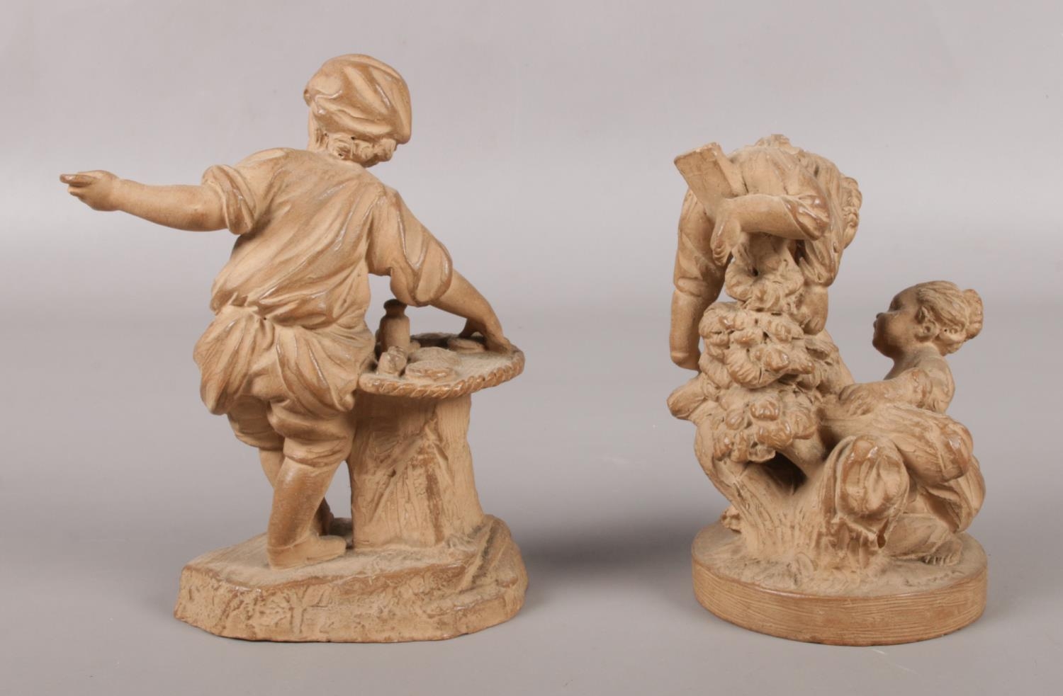 A pair of late 19th century French small terracotta sculptures. One of a young boy posing as a - Image 3 of 4