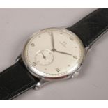 A gents stainless steel Omega manual wristwatch on leather strap. Silvered dial and subsidiary