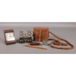 A small selection of collectables. Cased binoculars, an Amber Cheroot holder in original leather