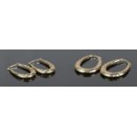 Two pairs of 9ct Gold horseshoe style earrings, stamped 375 to the hook. Total weight 4.22g.