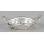 An Edwardian silver lozenge shaped bon bon dish with pierced decoration. Assayed Birmingham 1906