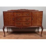 A Queen Anne style burr walnut bow front sideboard. Height 99.5cm, Width 140cm, Depth 54cm.