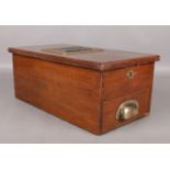 A Vintage wooden shop till with fitted drawer and brass handle. H: 18cm W:23 D: 43.5cm. Still has