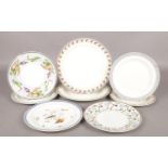 Eight early 19th century Wedgwood creamware plates. Includes example painted with a bird perched