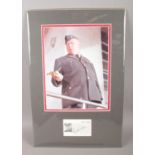 A mounted autograph and picture of German actor Gert Fröbe (1913-1988). He was best known in