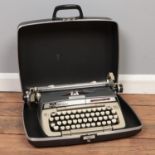 A Smith Corona Classic 12 cased typewriter.
