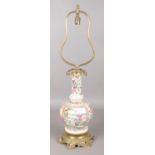 A 19th century Cantonese style porcelain vase converted to a table lamp. With bronze furniture and