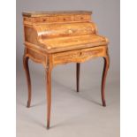 A late 19th/early 20th century marquetry kingwood bureau de dame. Raised on cabriole supports with