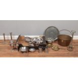A selection of assorted metalwares. To include English pewter tankards, tray and bowl, two candle