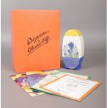 A boxed Wedgwood Clarice Cliff bonjour shape sugar sifter decorated in the Blue Crocus design.