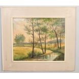 A framed oil on canvas, rural landscape with a tree lined river. Signed Paul Nash, 1942. 49cm x