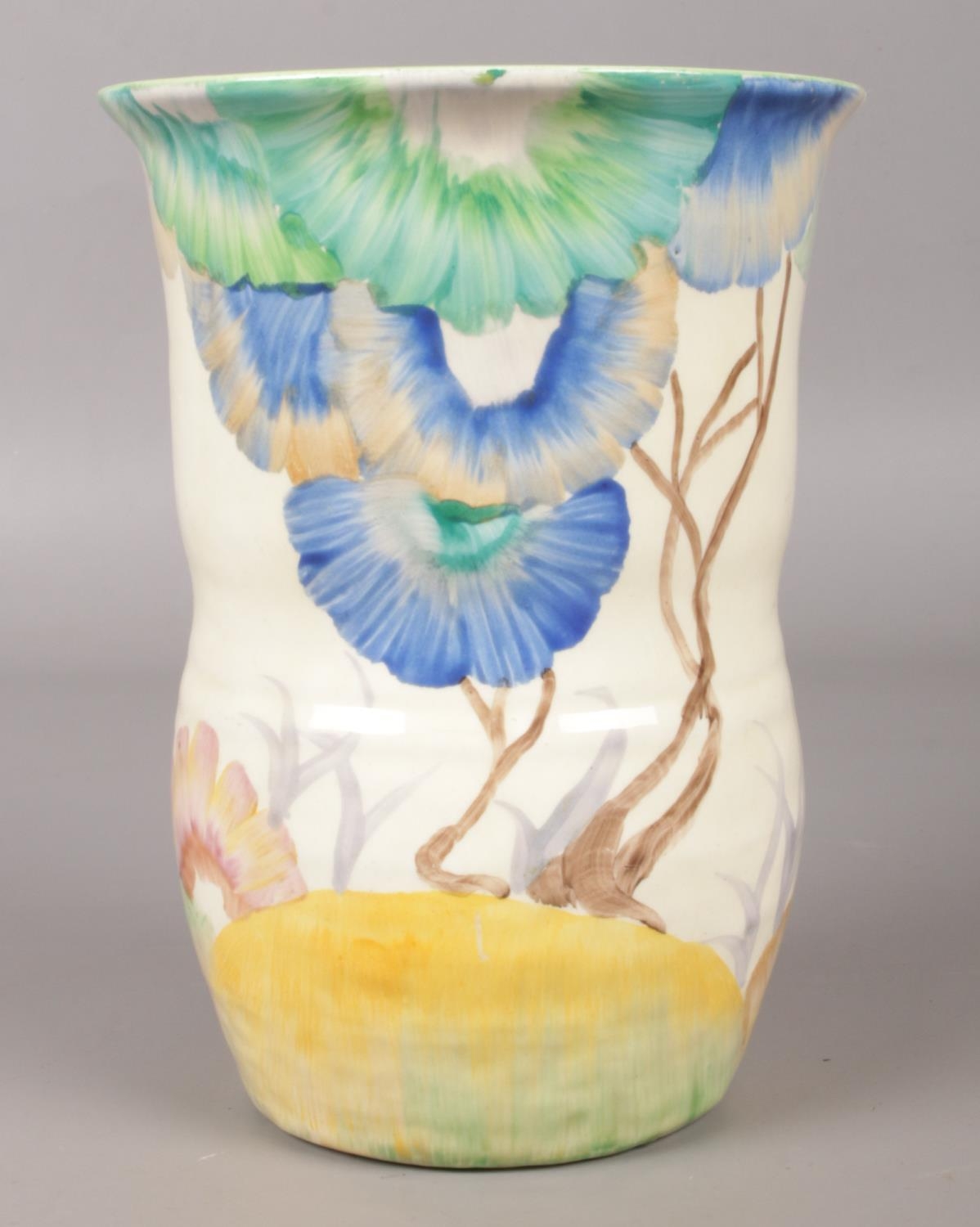 A Wilkinson Ltd Clarice Cliff Bizarre vase decorated in the Aurea design. Shape number 631. Height