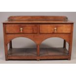 A mid 18th century oak low dresser. Height 79cm, Width 126cm, Depth 45cm.