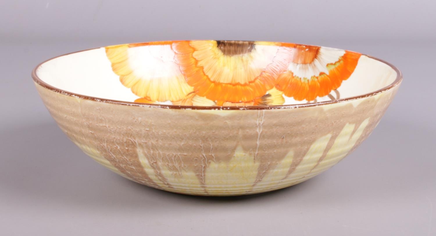 A Clarice Cliff ribbed bowl in the 'Rhodanthe' design. Marked Wilkinson LTD to base. (20cm diameter) - Image 3 of 4