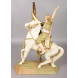 A Royal Dux figure modelled as a man carrying a flag on horseback. 45cm. The Dux is in very good