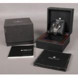 A gents stainless steel Tag Heuer Carrera automatic wristwatch. Black dial, baton markers, centre