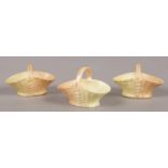 A collection of late 19th/early 20th Royal Worcester blush ivory miniature baskets.