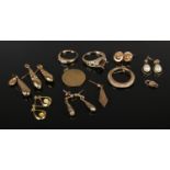 A quantity of gold and yellow metal jewellery oddments. Including earrings, rings, etc.