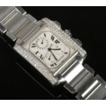 A diamond set stainless steel Cartier Tank Francaise chronograph wrist watch. Ref. 2303, no.
