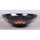 A large Moorcroft pottery bowl in the Oberon pattern, designed by Rachel Bishop. 26cm diameter.