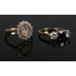 Two 9ct Gold rings, set with cubic zirconia and paste stones. Sizes S & U. Total weight: 8.06g.