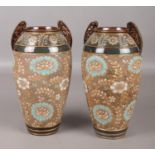 A pair of Doulton Lambeth Slaters Patent vases.