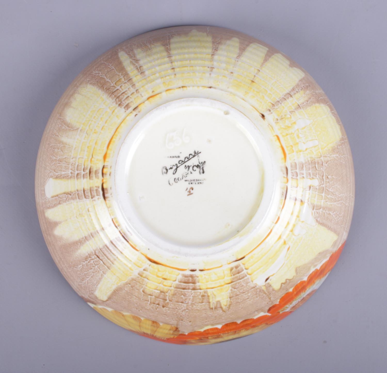 A Clarice Cliff ribbed bowl in the 'Rhodanthe' design. Marked Wilkinson LTD to base. (20cm diameter) - Image 2 of 4