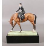 A Royal Worcester figure of a horse and rider, titled At The Meet, modelled by Doris Lindner. Number
